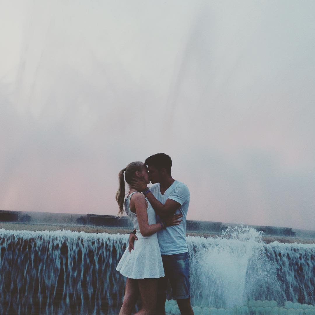 girl and boy kissing