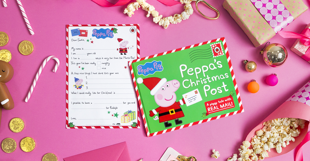 A photo of the Peppa Pig latter template on a pink background surrounded by Christmas decorations