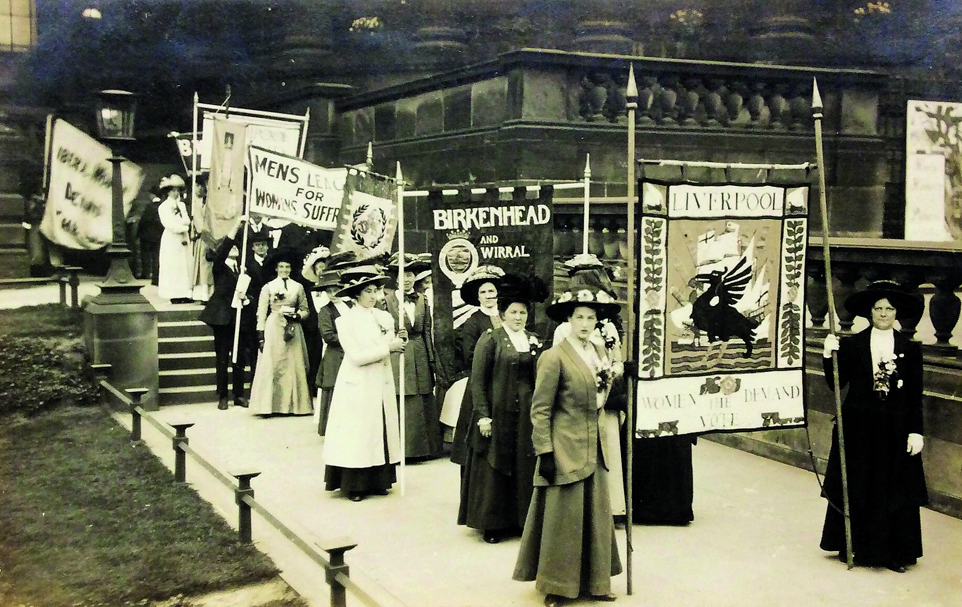 Suffragists - including men - from the north-west of England and their banners. This photograph is in the collection of Birkenhead pilgrim Alice New.