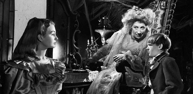 In the 1946 adaptation of Great Expectations, Miss Havisham (Martita Hunt) manipulates young Estella (Jean Simmons) and Pip (Tony Wager).