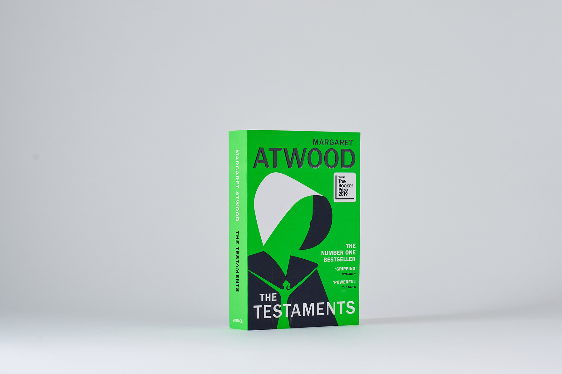 Photograph of The Testaments paperback edition against white background