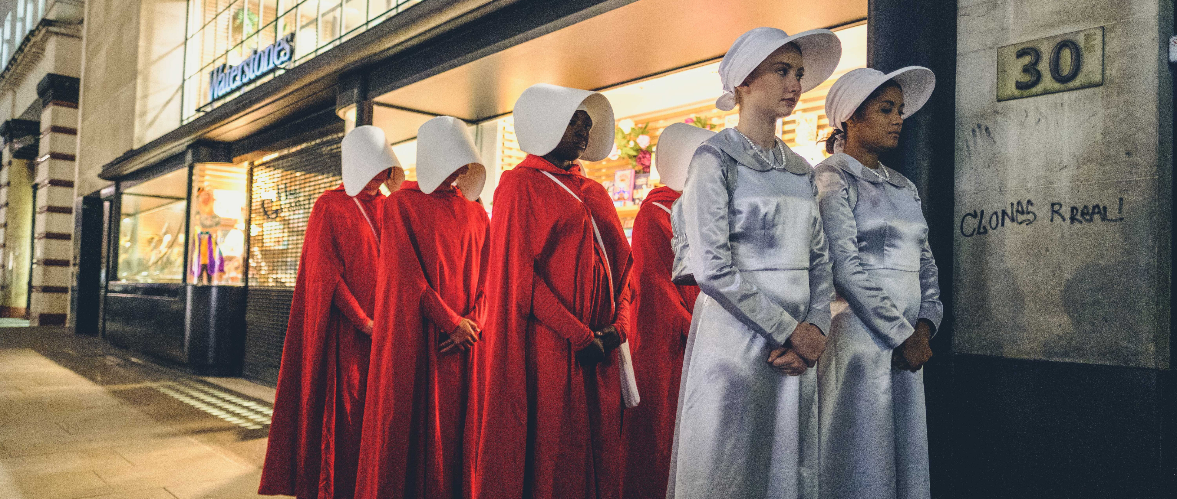 Handmaids and Pearl Girls outside Waterstones Piccadilly