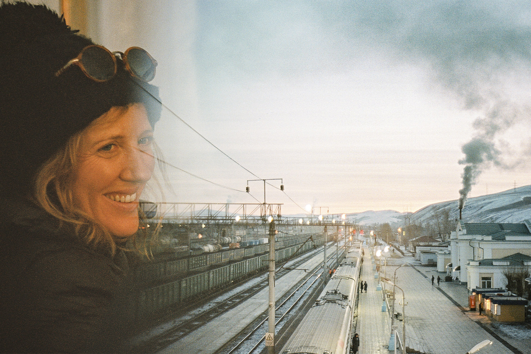 a colour photograph of Sophy Roberts on a train in Siberia