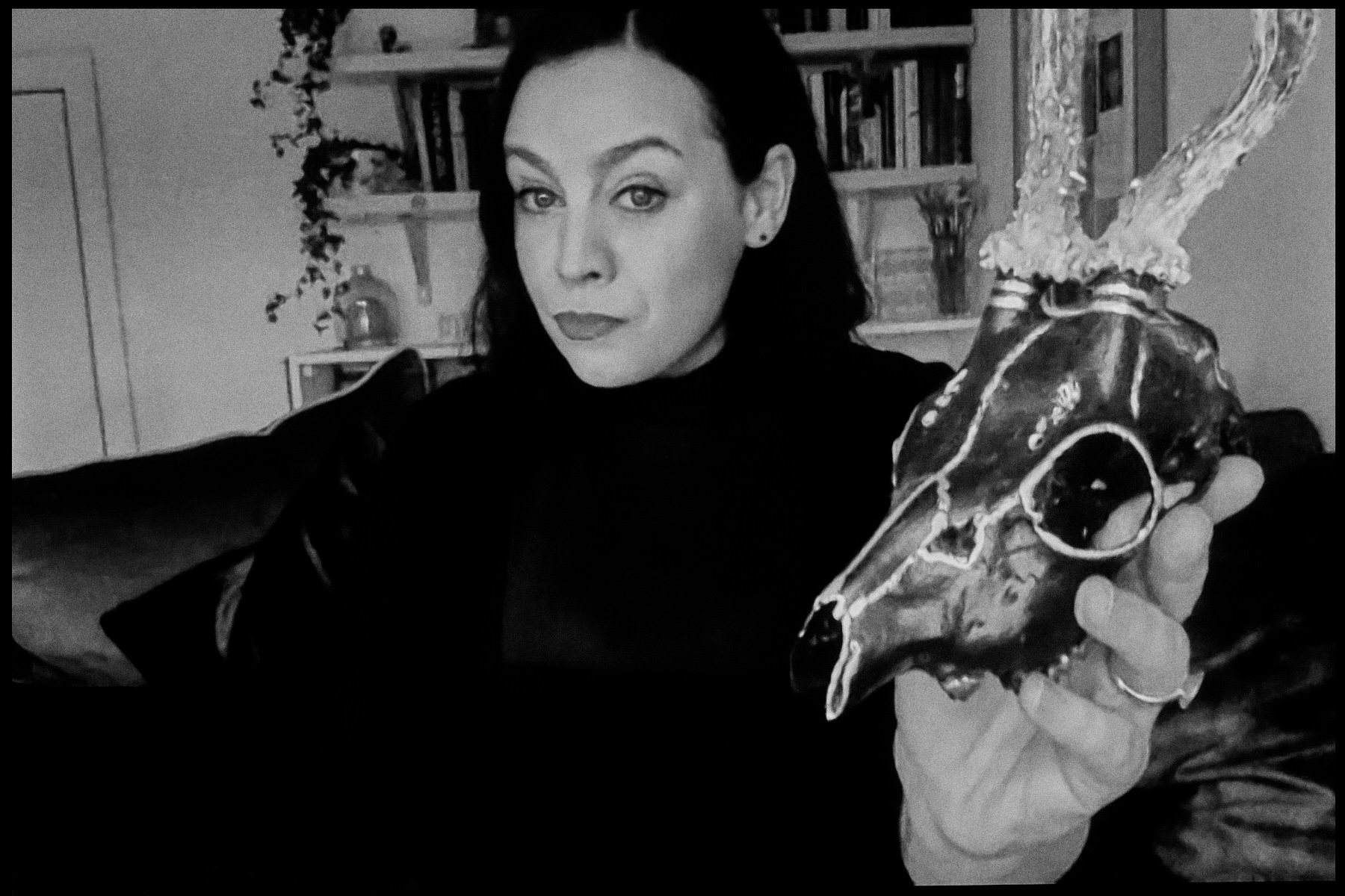 A portrait of Jenni Fagan with a horned skull 