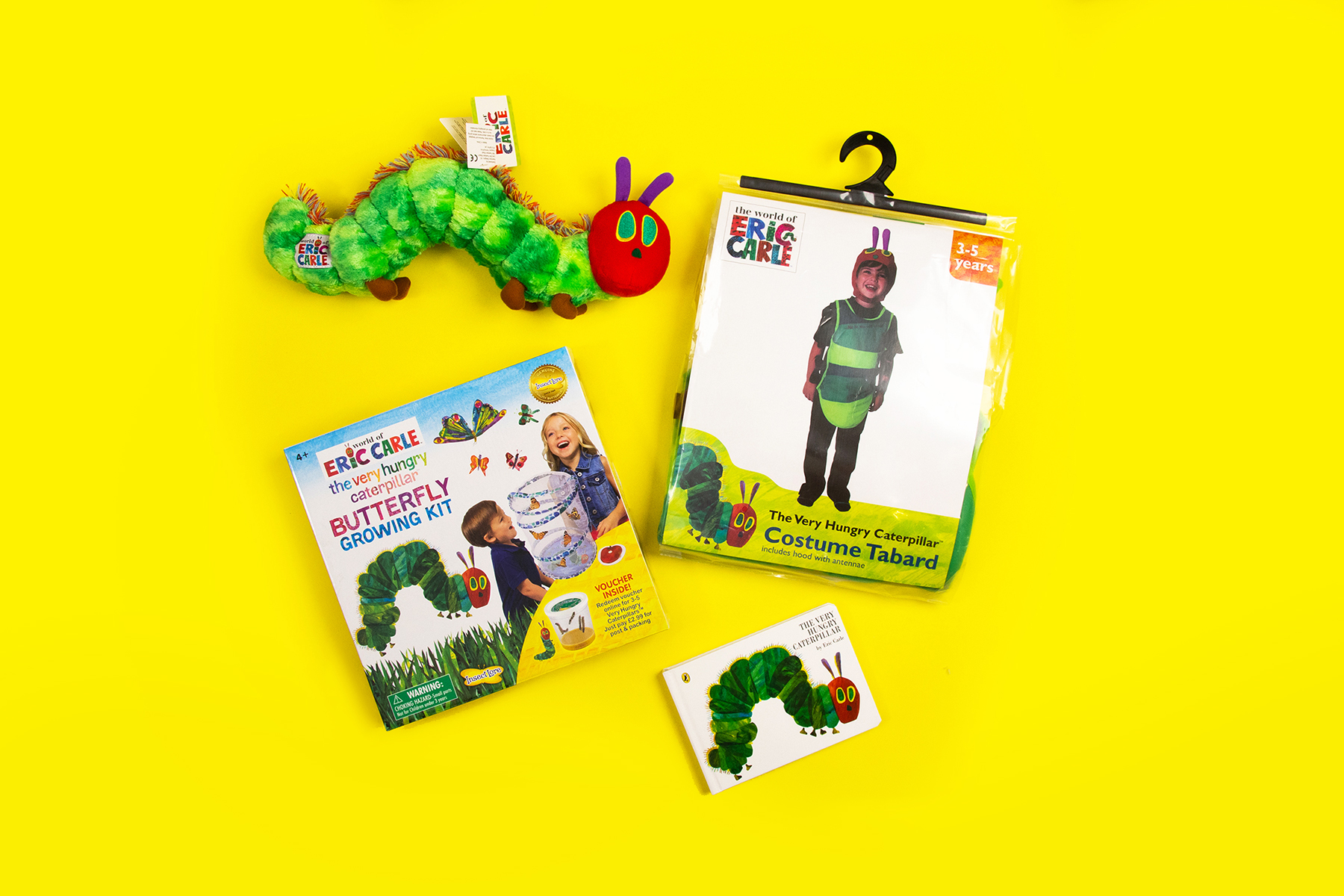 A photo of a selection of Very Hungry Caterpillar goodies to win including a book, a caterpillar costume, a butterfly growing kit and a toy