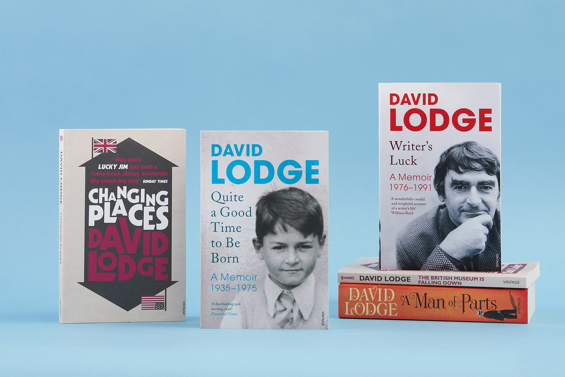 Books by David Lodge on a blue background