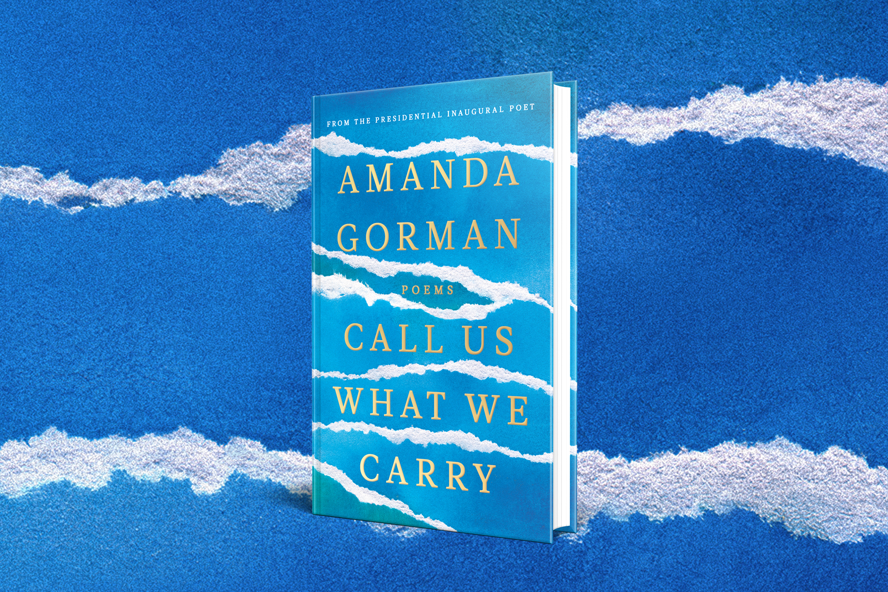 An image of Amanda Gorman's new poetry collection, Call Us What We Carry, against a blue and white background.