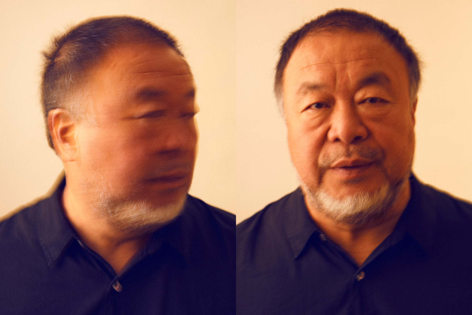 A photograph of Ai Wei-wei against a beige backdrop