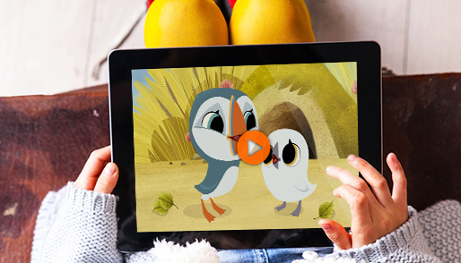 A child watches Puffin Rock on an iPad