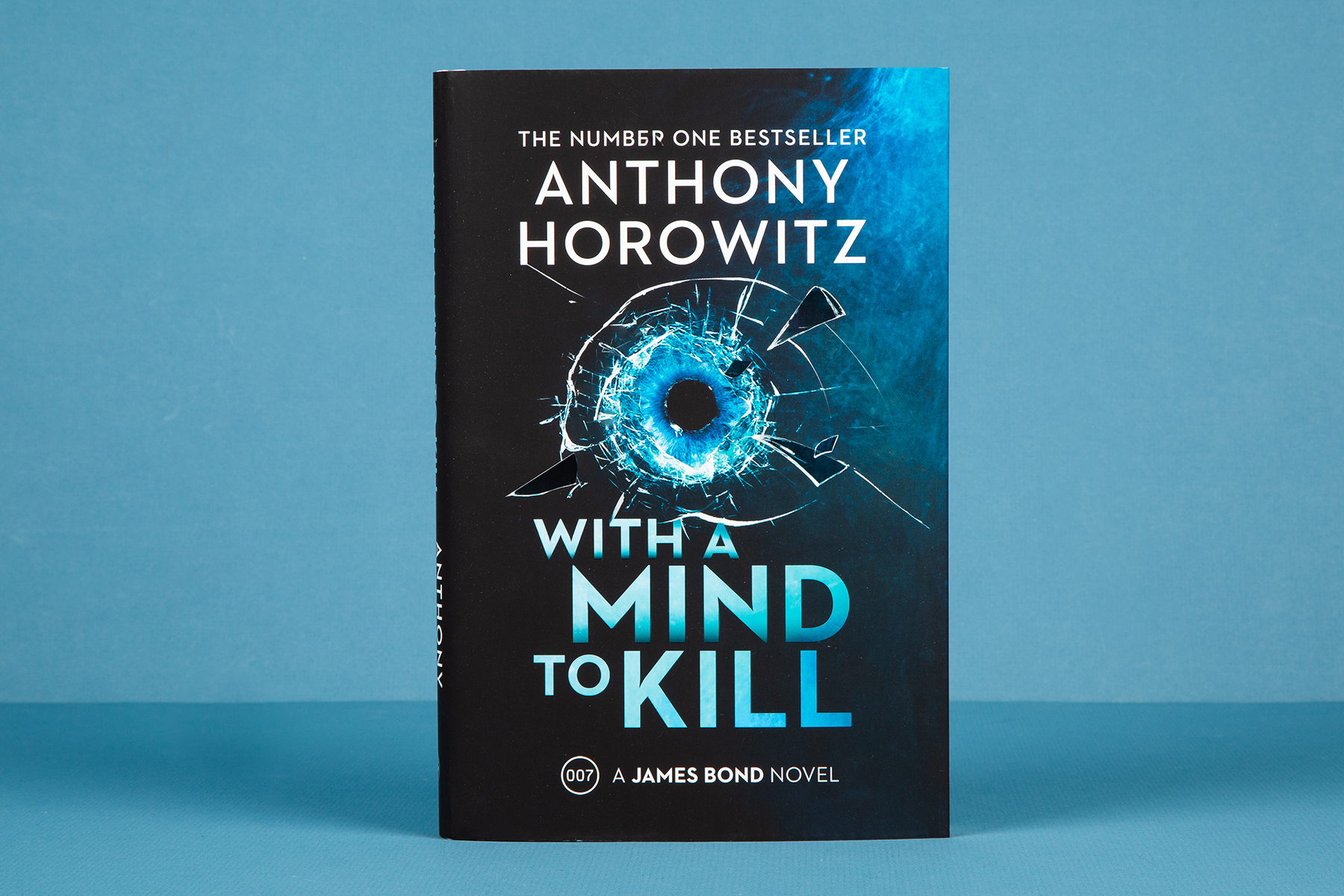 A photo of Anthony Horowitz's novel With a Mind to Kill against a blue background.