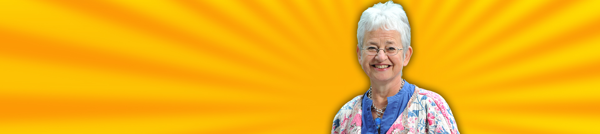 A photo of author Jacqueline Wilson on a yellow background with sun rays coming from behind her