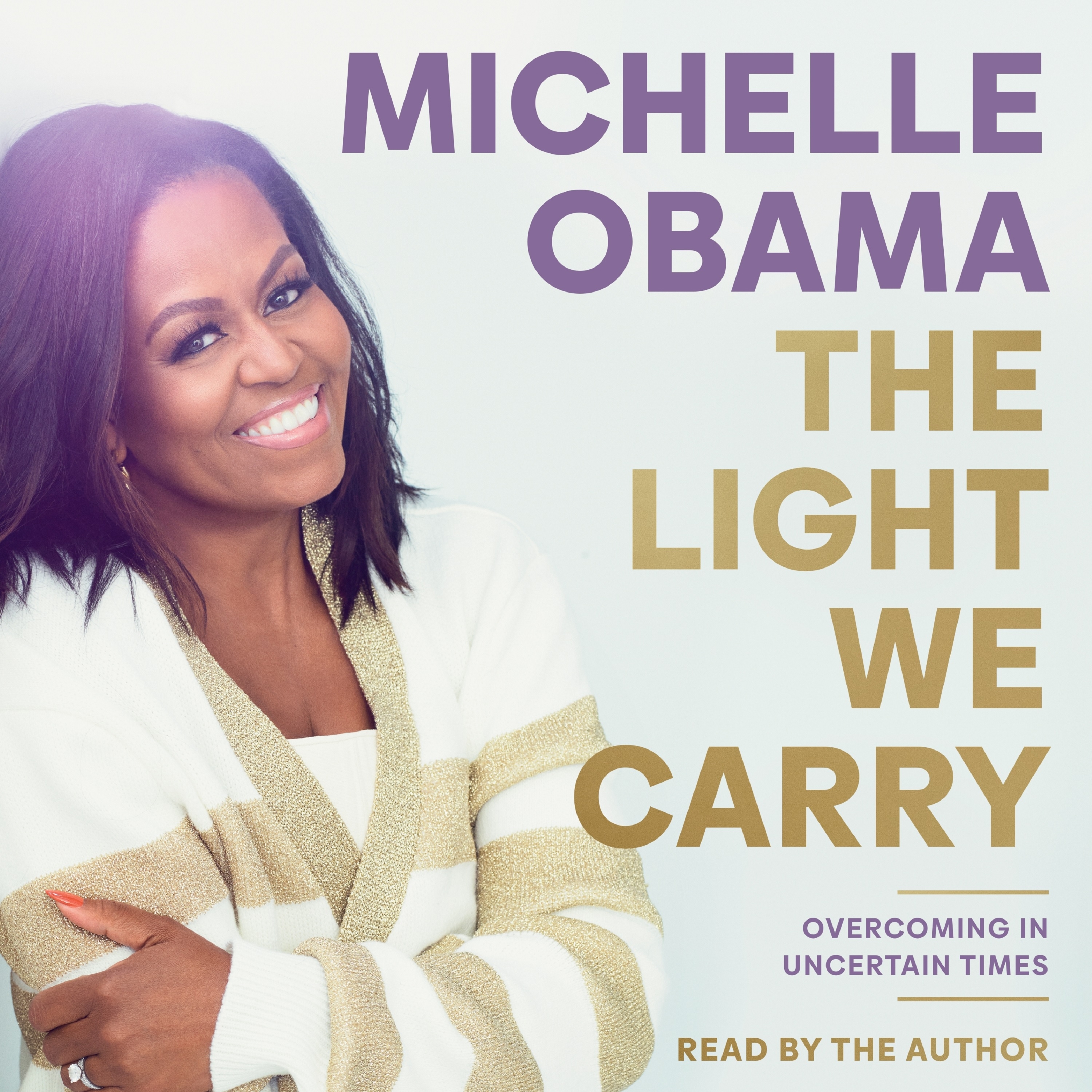Audiobook image: Grey background with a photograph of Michelle Obama smiling on the left hand side. Her name, and the title of the book are stacked in blue and gold text on the right hand side.