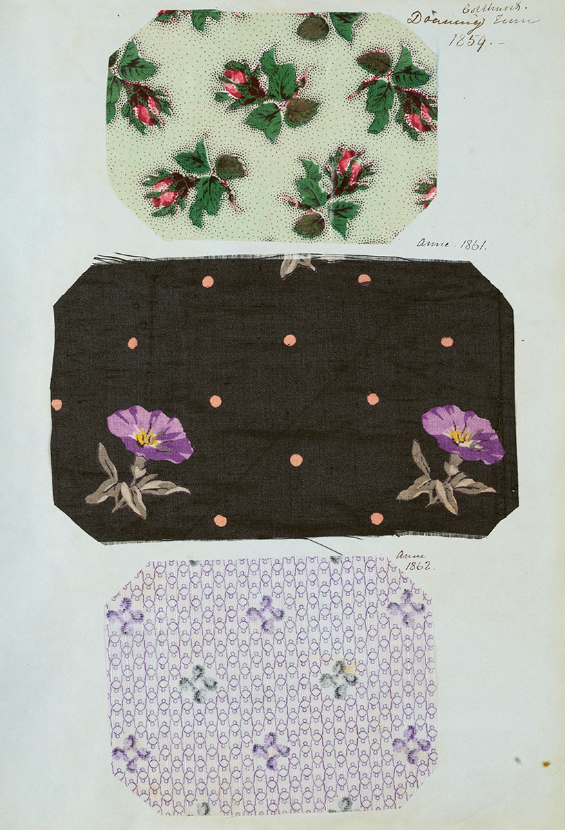 Three floral print fabrics, including a wax cotton rose print.