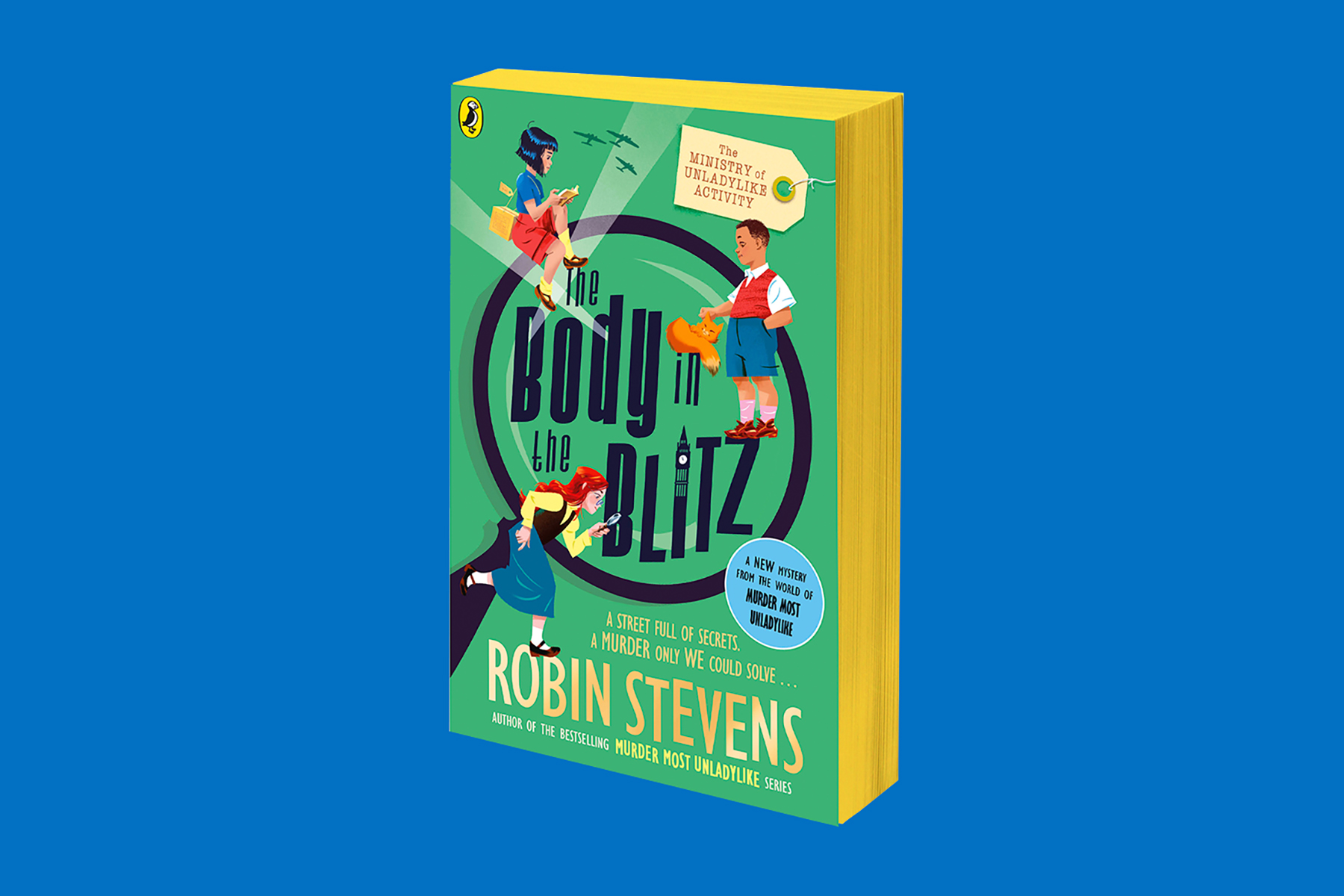 An image of the book cover of Robin Stevens' new book The Body in the Blitz on a plain blue background.
